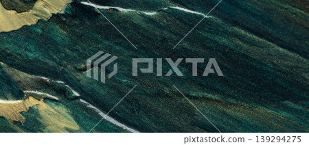 Dark teal and gold abstract textured background with flowing marble patterns and metallic accents Dark teal and gold abstract textured background with flowing marble patterns and metallic accents 139294275