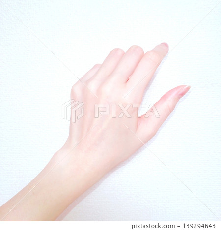 Beautiful and graceful female hand parts that stand out against a white background. Beautiful and graceful female hand parts that stand out against a white background. 139294643