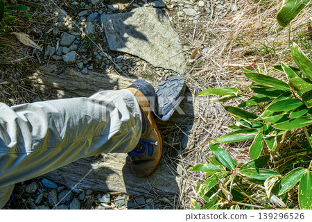 Boots with the soles coming off during hiking Boots with the soles coming off during hiking 139296526