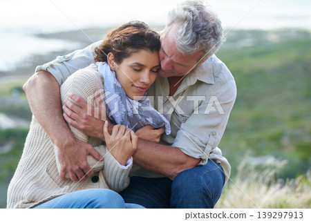 Couple, face and smile outdoor with hug for romance, love and relationship in nature with relaxing. Mature, man and woman or embrace with happy, peace and comfort for bonding, honeymoon and support Couple, face and smile outdoor with hug for romance, love and relationship in nature with relaxing. Mature, man and woman or embrace with happy, peace and comfort for bonding, honeymoon and support 139297913