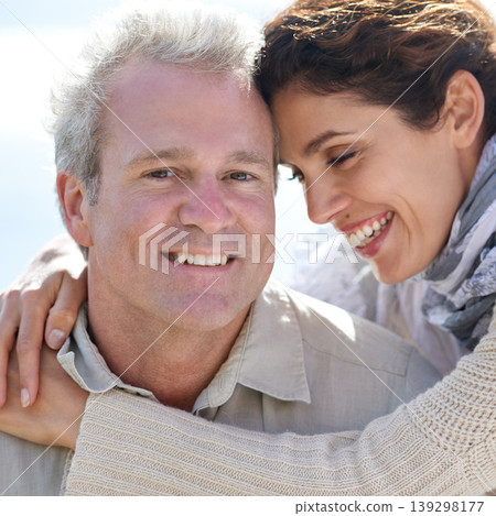 Couple, face and laughing in nature with hug for romance, love and relationship outdoor with relaxing. Mature, man and woman or embrace with happy, peace and trust for bonding, honeymoon and support Couple, face and laughing in nature with hug for romance, love and relationship outdoor with relaxing. Mature, man and woman or embrace with happy, peace and trust for bonding, honeymoon and support 139298177
