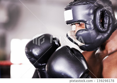 Man, gloves and boxing fitness for sports training or competition athlete, fearless fighter or safety gear. Black person, fist in ring exercise workout or punch practice or challenge, battle in mma Man, gloves and boxing fitness for sports training or competition athlete, fearless fighter or safety gear. Black person, fist in ring exercise workout or punch practice or challenge, battle in mma 139298178