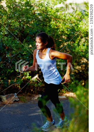 Running, health and fitness with woman in nature for summer, speed and cardio challenge. Wellness, sports and workout with female runner training in outdoor path for exercise, fast and performance Running, health and fitness with woman in nature for summer, speed and cardio challenge. Wellness, sports and workout with female runner training in outdoor path for exercise, fast and performance 139298209