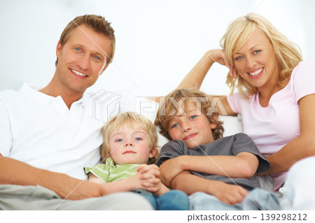 Portrait, smile and family in home together, bonding and relax, care or support on living room sofa. Happy face, parents and children in house lounge on couch with love for kids, father and mother Portrait, smile and family in home together, bonding and relax, care or support on living room sofa. Happy face, parents and children in house lounge on couch with love for kids, father and mother 139298212