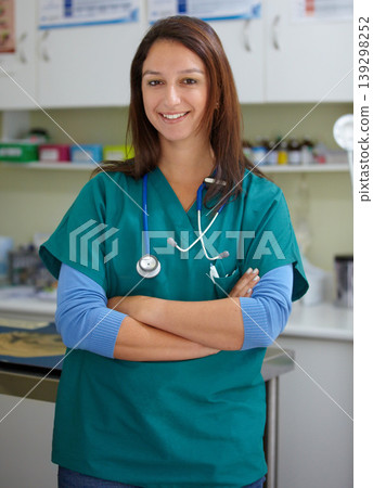 Happy woman, portrait and veterinarian professional at clinic for animal care, shelter or healthcare service. Female person, nurse or medical pet surgeon smile with arms crossed in confidence at vet Happy woman, portrait and veterinarian professional at clinic for animal care, shelter or healthcare service. Female person, nurse or medical pet surgeon smile with arms crossed in confidence at vet 139298252