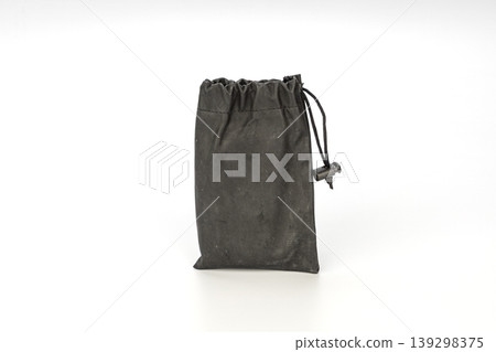Dark Gray Worn Fabric Drawstring Pouch Bag with Cord Lock Closure Isolated on White Background Studio Photography Dark Gray Worn Fabric Drawstring Pouch Bag with Cord Lock Closure Isolated on White Background Studio Photography 139298375