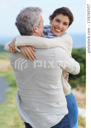 Couple, face and laughing in nature with hug for romance, love and relationship outdoor with date. Mature, man and woman or embrace with happy, playful and trust for bonding, honeymoon and support Couple, face and laughing in nature with hug for romance, love and relationship outdoor with date. Mature, man and woman or embrace with happy, playful and trust for bonding, honeymoon and support 139298507