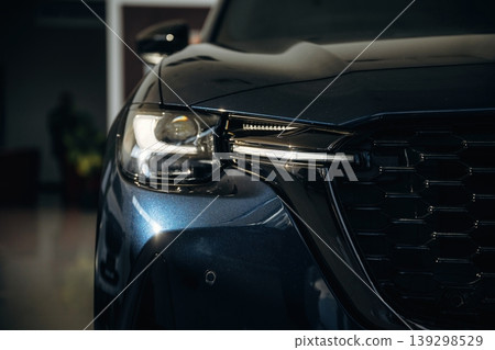 Particle detailed view of modern black car that is parked Particle detailed view of modern black car that is parked 139298529
