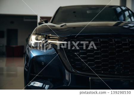 Particle detailed view of modern black car that is parked Particle detailed view of modern black car that is parked 139298530