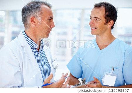 Healthcare, doctor and nurse with a clipboard, help and communication with test results, sign and wellness. Staff, medical and professional with documents, career and talking with physician or advice Healthcare, doctor and nurse with a clipboard, help and communication with test results, sign and wellness. Staff, medical and professional with documents, career and talking with physician or advice 139298597
