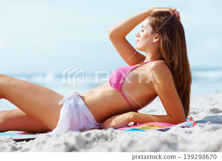 Relax, blue sky and happy woman in bikini on beach for summer vacation, travel adventure and sunshine on tropical island. Natural tan, smile and girl on ocean holiday, sun and peace at sea in Hawaii. Relax, blue sky and happy woman in bikini on beach for summer vacation, travel adventure and sunshine on tropical island. Natural tan, smile and girl on ocean holiday, sun and peace at sea in Hawaii. 139298670