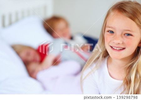 Child portrait, smile and family on bed with love together, hug and bonding with relax wellness in home. Girl, face and happiness in morning for support, care and peace with positive kid in apartment Child portrait, smile and family on bed with love together, hug and bonding with relax wellness in home. Girl, face and happiness in morning for support, care and peace with positive kid in apartment 139298798