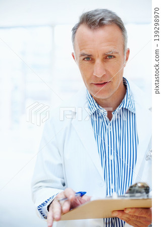 Health, question and doctor with checklist on clipboard, chart or survey for insurance and medical information. Healthcare, man and portrait with paperwork, report or check up at clinic or hospital Health, question and doctor with checklist on clipboard, chart or survey for insurance and medical information. Healthcare, man and portrait with paperwork, report or check up at clinic or hospital 139298970