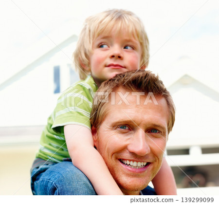 Father, son and smile outdoor with piggyback for bonding, relationship and freedom in garden of home. Family, man or boy child with playing, care and love for happiness, peace and support in backyard Father, son and smile outdoor with piggyback for bonding, relationship and freedom in garden of home. Family, man or boy child with playing, care and love for happiness, peace and support in backyard 139299099