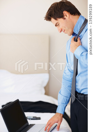Business man, laptop and tie in bedroom for preparation, typing or ideas for problem solving in home. Lawyer, computer or start morning with scroll, solution or planning for decision in legal process Business man, laptop and tie in bedroom for preparation, typing or ideas for problem solving in home. Lawyer, computer or start morning with scroll, solution or planning for decision in legal process 139299189