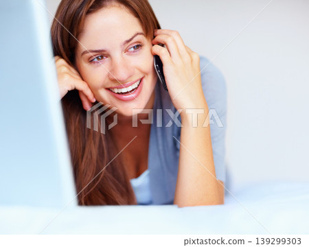 Phone call, laptop and woman on bed with smile, networking and communication in home. Wake up, relax and happy girl with cellphone, computer and conversation for connection, chat and talk in bedroom. Phone call, laptop and woman on bed with smile, networking and communication in home. Wake up, relax and happy girl with cellphone, computer and conversation for connection, chat and talk in bedroom. 139299303