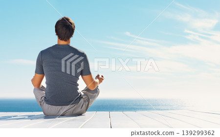 Relax person, blue sky and yoga meditation for spiritual peace, freedom or healing zen soul, aura or chakra energy balance. Mockup space, sunshine and back of mindfulness yogi on nature beach patio Relax person, blue sky and yoga meditation for spiritual peace, freedom or healing zen soul, aura or chakra energy balance. Mockup space, sunshine and back of mindfulness yogi on nature beach patio 139299362