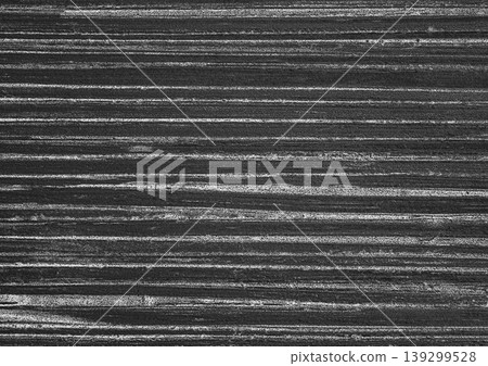 Closeup lines texture stripes wooden dark grunge surface wood background board pattern plank black Closeup lines texture stripes wooden dark grunge surface wood background board pattern plank black 139299528