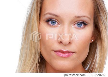 Skin care, portrait and beauty of a woman in studio for glow, shine and flawless look. Face of a young female model person on a white background with confidence, dermatology and cosmetics or makeup Skin care, portrait and beauty of a woman in studio for glow, shine and flawless look. Face of a young female model person on a white background with confidence, dermatology and cosmetics or makeup 139299692