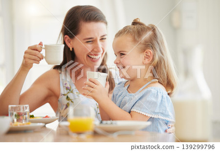 Mom, girl and breakfast in home with tea cup, comic laugh and relax with drink, food and bonding at table. Love, mother and daughter with coffee, juice and smile with care, happy and family house Mom, girl and breakfast in home with tea cup, comic laugh and relax with drink, food and bonding at table. Love, mother and daughter with coffee, juice and smile with care, happy and family house 139299796