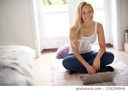 Woman, remote work and portrait with laptop in home, apartment or online education. Virtual, course and person typing on computer studying for university, elearning and project for college in house Woman, remote work and portrait with laptop in home, apartment or online education. Virtual, course and person typing on computer studying for university, elearning and project for college in house 139299944