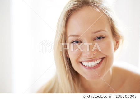 Happy woman, dermatology and portrait for closeup in home for skincare, beauty and cosmetics. Person, hair and face with excitement for treatment of texture, anti aging or smile with vitamin c Happy woman, dermatology and portrait for closeup in home for skincare, beauty and cosmetics. Person, hair and face with excitement for treatment of texture, anti aging or smile with vitamin c 139300005