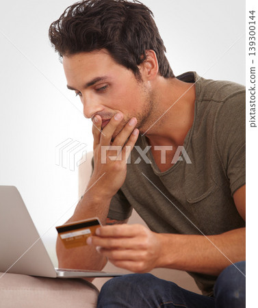 Man, stress and credit card on laptop for home online shopping, e commerce mistake or payment error. Shocked person check wrong balance, phishing warning and cybersecurity risk of banking on computer 139300144