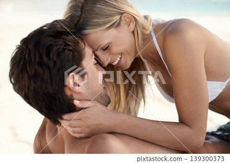 Couple, face and happy on beach with love, romance and bonding on vacation, holiday or travel. Relationship, man and woman with care, affection and peace in nature with relax or carefree by ocean Couple, face and happy on beach with love, romance and bonding on vacation, holiday or travel. Relationship, man and woman with care, affection and peace in nature with relax or carefree by ocean 139300373