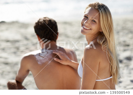 Beach, happy couple or apply sunscreen heat on vacation, holiday or weekend trip travel together. Love, uv protection or suncream application for summer skin safety, solar security or SPF sunblock. Beach, happy couple or apply sunscreen heat on vacation, holiday or weekend trip travel together. Love, uv protection or suncream application for summer skin safety, solar security or SPF sunblock. 139300549