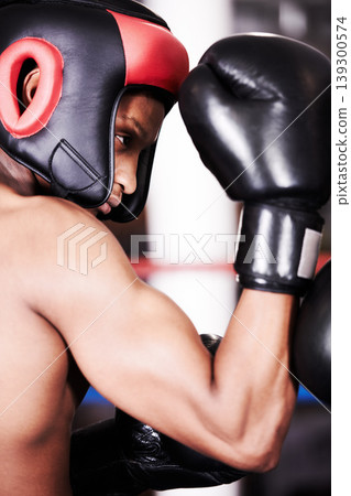 Man, boxer and fight at gym ring for workout, exercise or indoor self defense training together. Male person, fighter or sports trainer in boxing match, competition or practice with sparing partner Man, boxer and fight at gym ring for workout, exercise or indoor self defense training together. Male person, fighter or sports trainer in boxing match, competition or practice with sparing partner 139300574