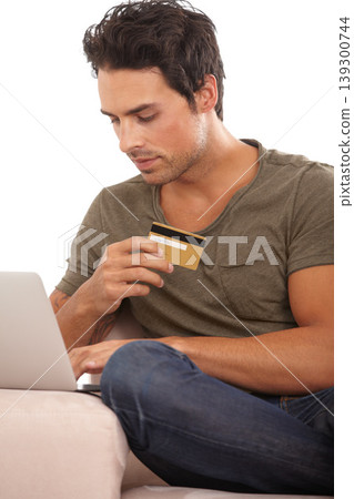 Laptop, credit card and relax with man on sofa for online shopping, digital payment and fintech. Ecommerce, banking and bills with male customer in living room of home for technology and web Laptop, credit card and relax with man on sofa for online shopping, digital payment and fintech. Ecommerce, banking and bills with male customer in living room of home for technology and web 139300744
