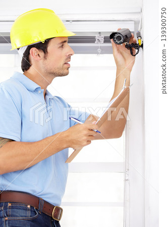 Technician man, clipboard and security camera for home CCTV installation and documents for safety or maintenance. Engineering contractor with checklist for surveillance, inspection and services Technician man, clipboard and security camera for home CCTV installation and documents for safety or maintenance. Engineering contractor with checklist for surveillance, inspection and services 139300750