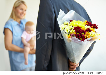 Husband, wife and hiding flowers for surprise, excited and happy with baby, love and appreciation. Bouquet, romance and good news for marriage, relationship and announcement with romantic partner 139300855