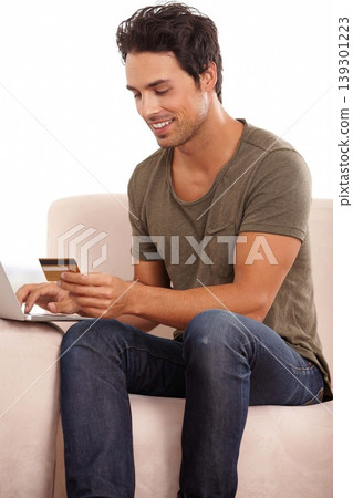 Credit card, computer and man on sofa for online shopping, e commerce and digital payment and home fintech. Person on couch, typing on laptop and internet banking for financial investment or sale Credit card, computer and man on sofa for online shopping, e commerce and digital payment and home fintech. Person on couch, typing on laptop and internet banking for financial investment or sale 139301223