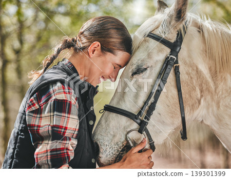 Happy woman with horse in forest, embrace in nature and love for animals, pets or dressage with trees. Equestrian sport, girl jockey or rider standing in woods for adventure, hug and smile on face. Happy woman with horse in forest, embrace in nature and love for animals, pets or dressage with trees. Equestrian sport, girl jockey or rider standing in woods for adventure, hug and smile on face. 139301399