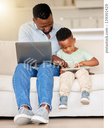 Family, man and boy with laptop for teaching in home for learning, playing and game on tablet. Father, kid and childcare with technology for skill, growth and development in milestone in living room Family, man and boy with laptop for teaching in home for learning, playing and game on tablet. Father, kid and childcare with technology for skill, growth and development in milestone in living room 139301429