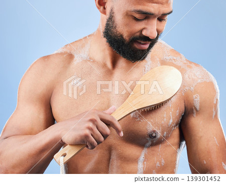 Man, shower and brush for cleaning in studio with armpit, scrub and thinking for hygiene by blue background. Person, guy and foam for spa, cosmetics and wellness for body, skincare and healthy Man, shower and brush for cleaning in studio with armpit, scrub and thinking for hygiene by blue background. Person, guy and foam for spa, cosmetics and wellness for body, skincare and healthy 139301452
