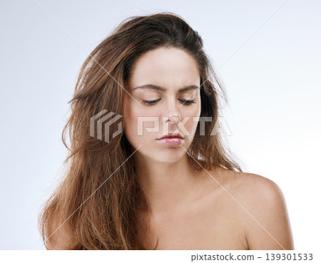 Woman, face and eyes closed for beauty in studio with mockup haircare, skin and health on white background. Female model, hair and treatment for glowing skin by moisturiser, hydration or vitamin c Woman, face and eyes closed for beauty in studio with mockup haircare, skin and health on white background. Female model, hair and treatment for glowing skin by moisturiser, hydration or vitamin c 139301533