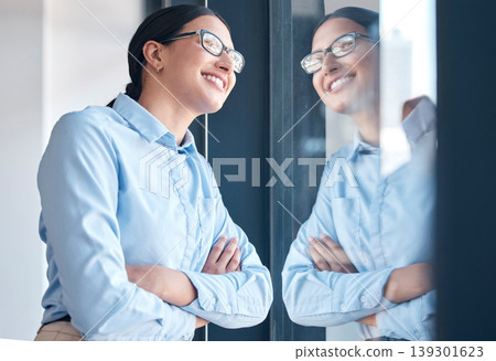 Business, woman and thinking at window with arms crossed, confidence and vision in office. Entrepreneur, dream and inspiration for ideas, planning and goals in workplace and startup in Portugal Business, woman and thinking at window with arms crossed, confidence and vision in office. Entrepreneur, dream and inspiration for ideas, planning and goals in workplace and startup in Portugal 139301623