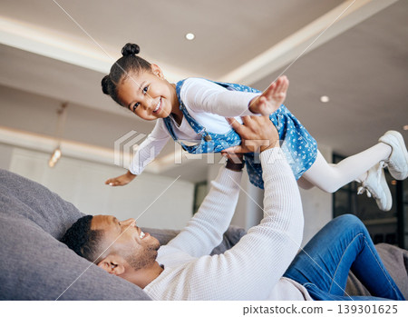 Father, child and airplane play at home, fun and bonding in childhood, love and smile for freedom. Happy, dad and daughter on couch, flying and portrait or face, joy and excited for fantasy game Father, child and airplane play at home, fun and bonding in childhood, love and smile for freedom. Happy, dad and daughter on couch, flying and portrait or face, joy and excited for fantasy game 139301625