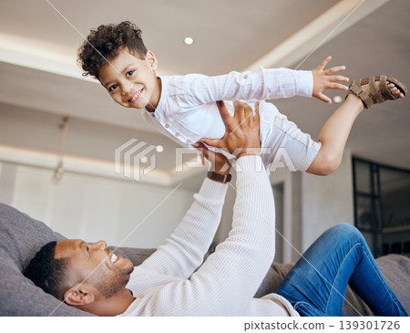 Dad, child and airplane play on couch, fun and bonding in childhood, love and smile for freedom. Happy, father and son at home, flying and portrait or support, joy and excited for fantasy game Dad, child and airplane play on couch, fun and bonding in childhood, love and smile for freedom. Happy, father and son at home, flying and portrait or support, joy and excited for fantasy game 139301726