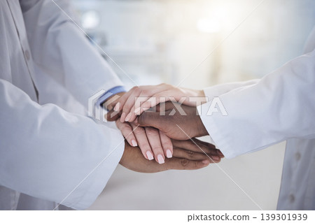 Hands, teamwork and doctors in the hospital for unity or solidarity in medicine or healthcare. Medical, support or motivation with health professionals closeup in a clinic for treatment goals Hands, teamwork and doctors in the hospital for unity or solidarity in medicine or healthcare. Medical, support or motivation with health professionals closeup in a clinic for treatment goals 139301939