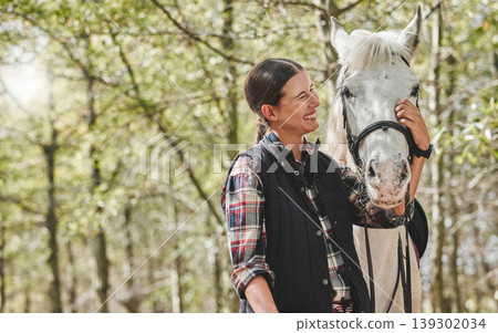 Happy woman with horse standing in forest, nature and love for animals, pets or dressage with trees in mockup space. Equestrian sport, jockey or rider in woods for adventure, pride and smile on face. Happy woman with horse standing in forest, nature and love for animals, pets or dressage with trees in mockup space. Equestrian sport, jockey or rider in woods for adventure, pride and smile on face. 139302034