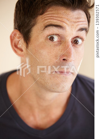 Shock, comic and portrait of man in studio with funny facial expression, reaction and emotions. Emoji, humor and face closeup of person with surprise, what and omg for news on color background Shock, comic and portrait of man in studio with funny facial expression, reaction and emotions. Emoji, humor and face closeup of person with surprise, what and omg for news on color background 139302571