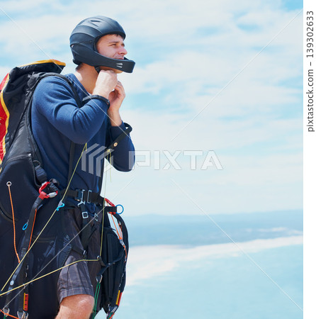 Preparation, parachute or man with helmet for sport, safety or gear to exercise for health wellness. Sky mockup, equipment or fitness in nature for outdoor training, fearless or countryside adventure Preparation, parachute or man with helmet for sport, safety or gear to exercise for health wellness. Sky mockup, equipment or fitness in nature for outdoor training, fearless or countryside adventure 139302633