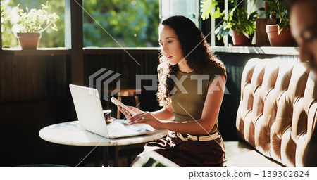 Laptop, phone and woman in coffee shop with freelance career for cafeteria review on dining blog. Technology, cellphone and restaurant critic with computer for online article with diner website. Laptop, phone and woman in coffee shop with freelance career for cafeteria review on dining blog. Technology, cellphone and restaurant critic with computer for online article with diner website. 139302824