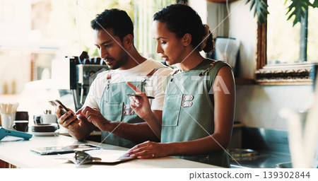 Business people, phone and inventory with checklist in cafe for stock control or online order. Man, woman or employees with smartphone or clipboard in coffee shop for revenue, finance or analysis 139302844