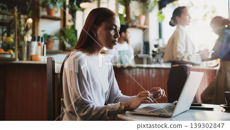 Woman, freelancer and journalism with laptop in cafe for network, internet access or research. Female person, journalist or remote work with computer in coffee shop for online article or magazine 139302847
