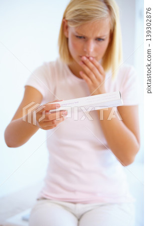 Anxiety, nervous and woman with pregnancy test in bathroom waiting for results, news and lines. Motherhood, pregnant and worried person with medical testing kit for fertility or ovulation at home Anxiety, nervous and woman with pregnancy test in bathroom waiting for results, news and lines. Motherhood, pregnant and worried person with medical testing kit for fertility or ovulation at home 139302876