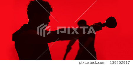 Fitness, collage or people in studio with strength training, kettlebell or battle rope in bodybuilding. Exercise, silhouette or athletes with equipment, joint workout or muscle gain on red background Fitness, collage or people in studio with strength training, kettlebell or battle rope in bodybuilding. Exercise, silhouette or athletes with equipment, joint workout or muscle gain on red background 139302917